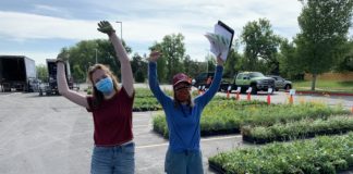 Practicing New Work Protocols during the COVID-19 Pandemic workers wearing masks due to covid